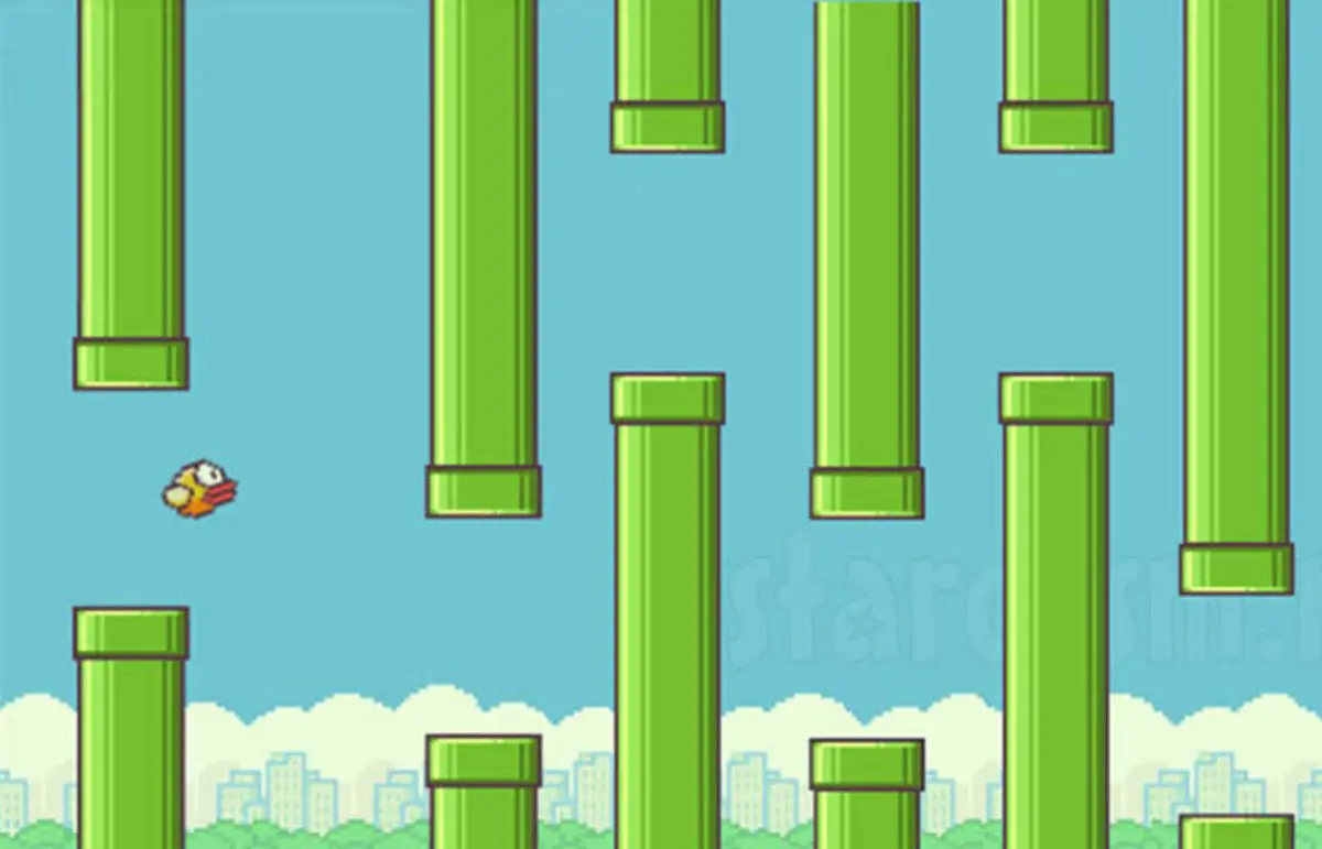 Flappy Bird gameplay: the pixel bird flying between rows of green pipes above a cartoon city skyline